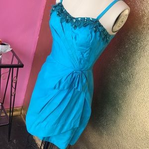 60's Tiki wrap around turquoise dress small